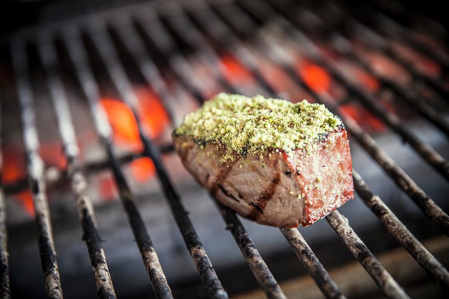 Tuna Steak With A Pistachio Crust On A Grill Photograph by Imagerie