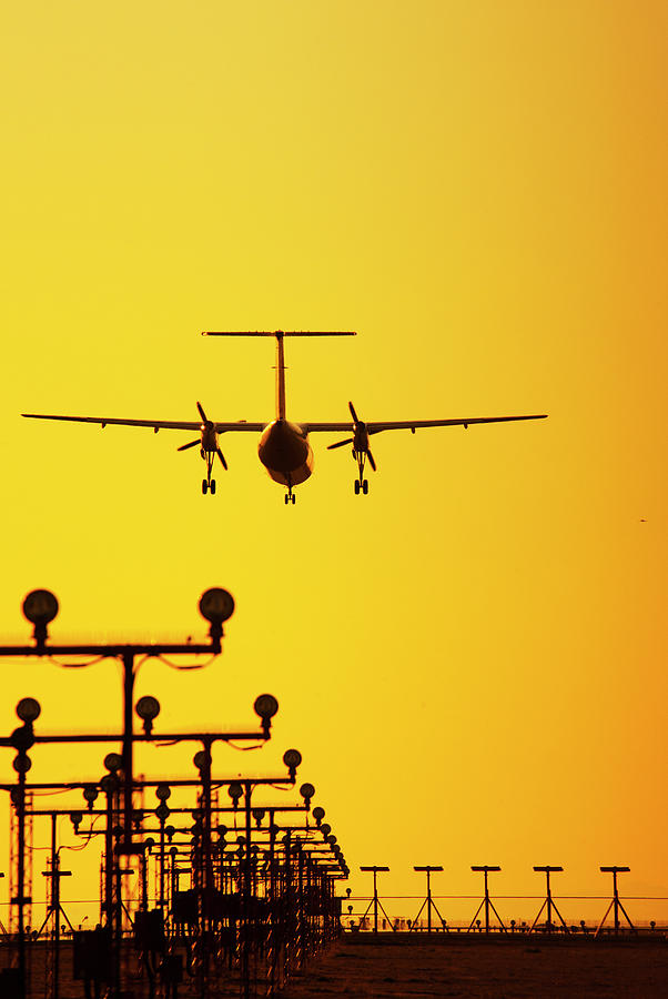Turboprop Commercial Airplane Landing Photograph by Brian Stablyk