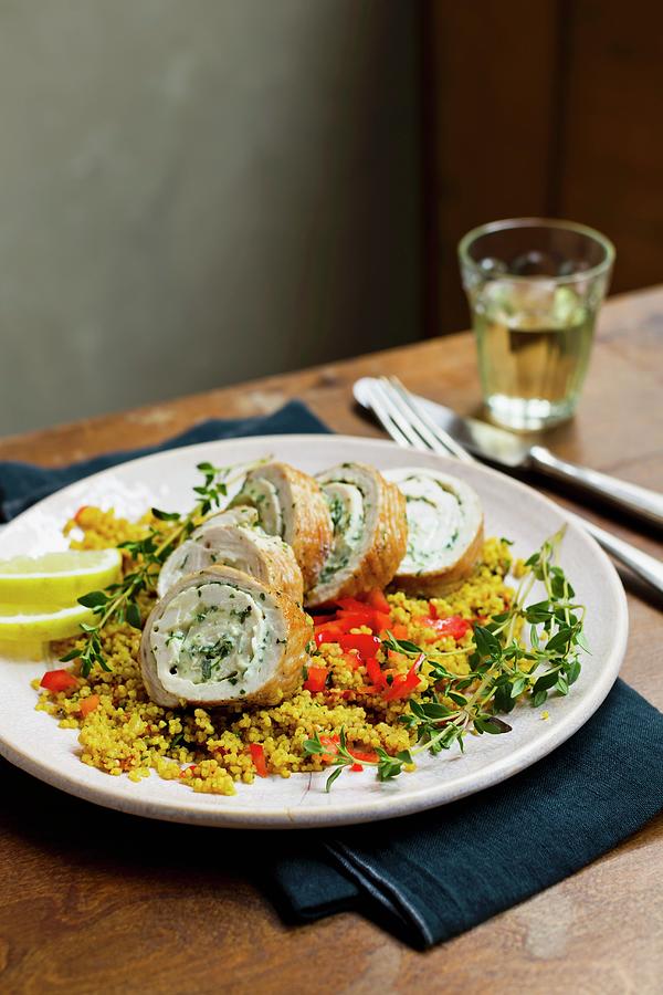 Turkey And Herb Roulade On A Bed Of Couscous Photograph by Sporrer/skowronek