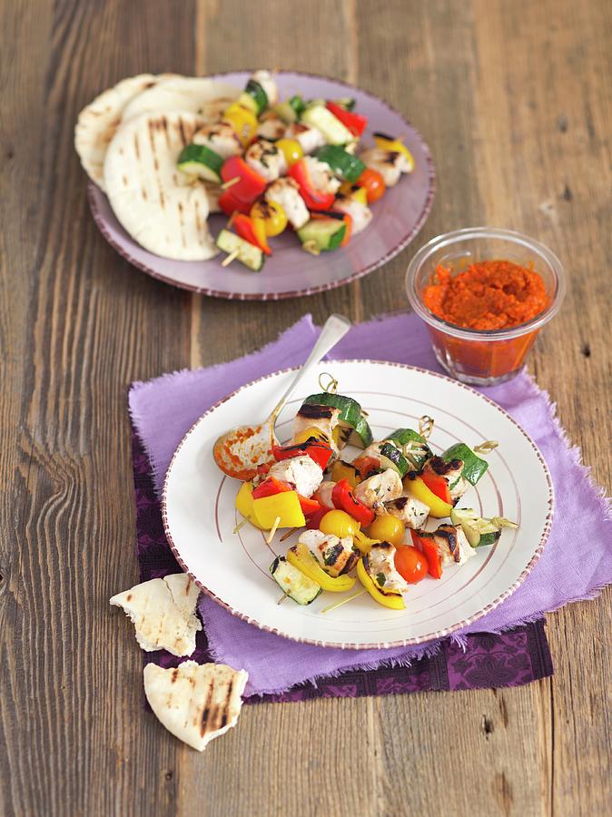 Turkey Breast And Vegetable Skewers With Ajvar And Unleavened Bread Photograph by Rua Castilho