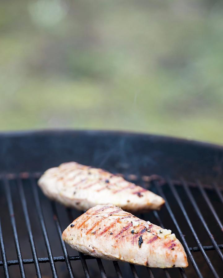 Turkey Breast Fillets On A Barbecue Photograph by Jo Kirchherr