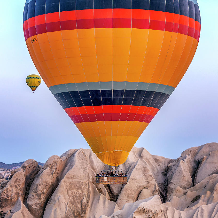 Turkey, Central Anatolia, Goreme, Cappadocia, Hot Air Balloon Flying Over The Hills And Plains Of Goreme National Park And Cappadocia Digital Art by Chantal Reed