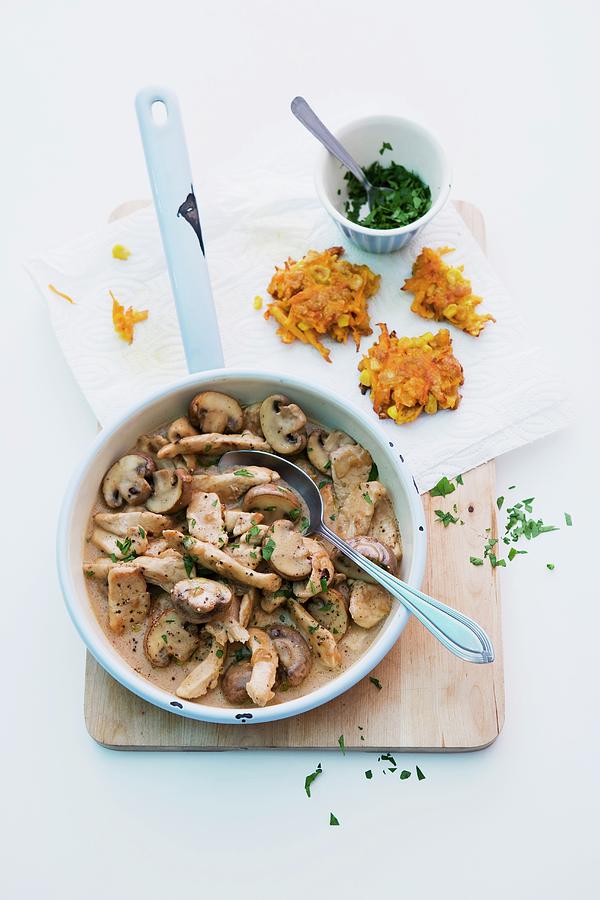 Turkey With Mushrooms And Carrot And Sweetcorn Cakes Photograph by Michael Wissing