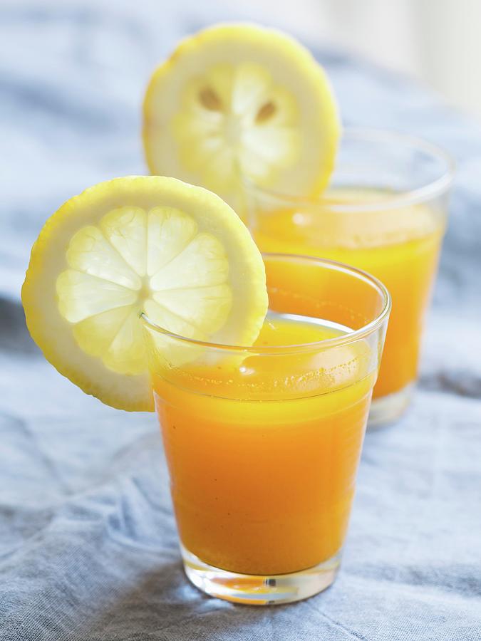 Turmeric Shots With Ginger And Lemon Juice Photograph by Magdalena ...