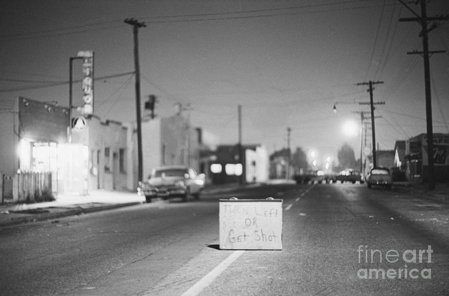 Turn Left Or Get Shot Sign In Street Photograph by Bettmann