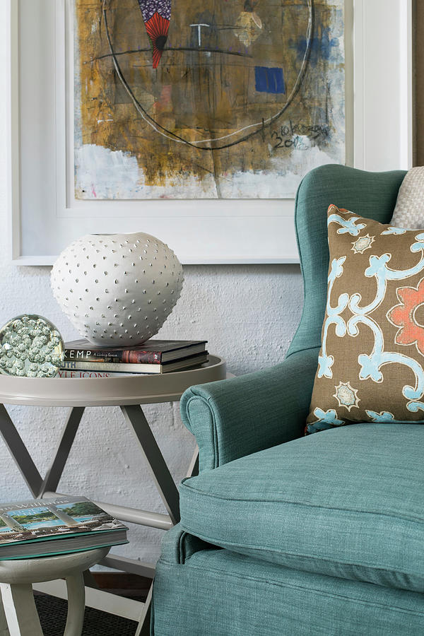 Turquoise Armchair And Side Table Below Painting On Wall Photograph by Great Stock!