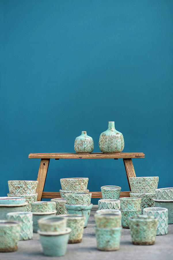 Turquoise-glazed Pots And Vases On And In Front Of Wooden Bench Photograph by Magdalena Bjrnsdotter
