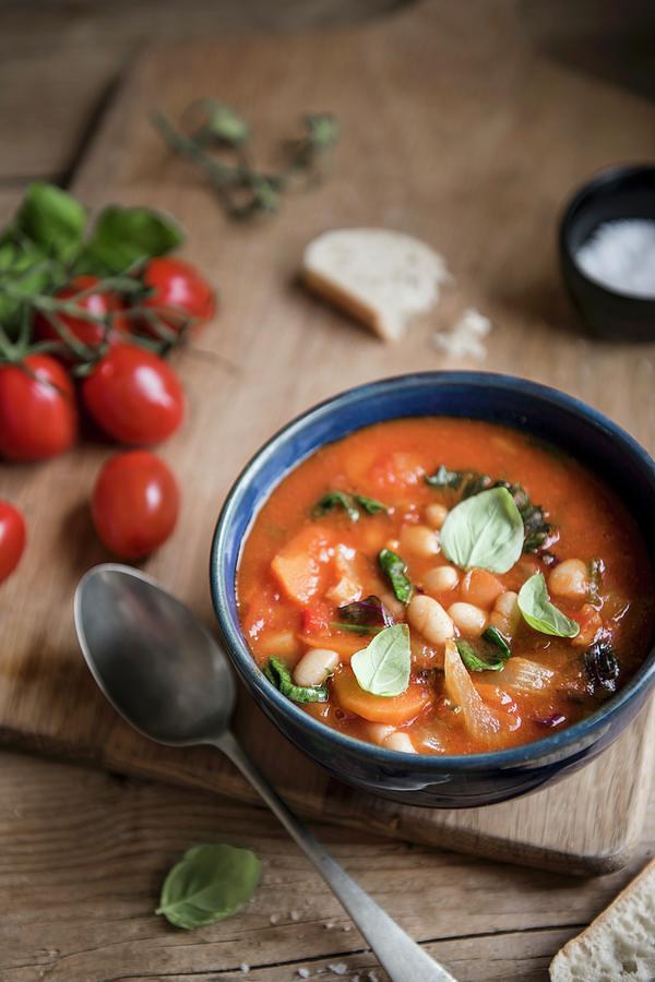 Tuscan Ribollita Soup With Beans, Tomatoes, Kale And Basil In A Bowl Photograph by Magdalena Hendey