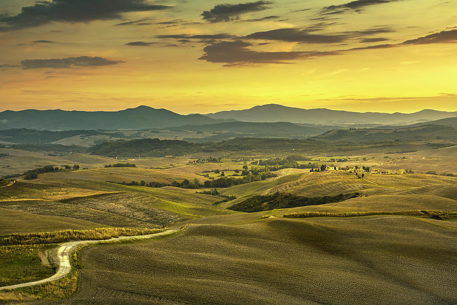 Tuscany spring, rolling hills, rural, road and green fields on s Photograph by Stefano Orazzini