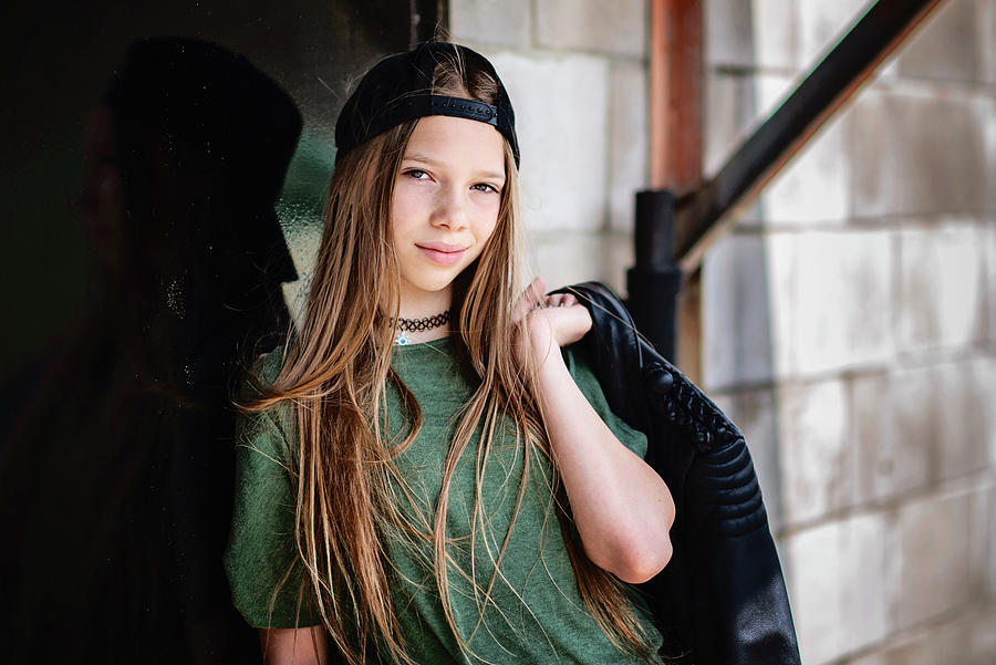 Tween Girl With Blond Hair And Black Jacket Hanging Out In The City ...