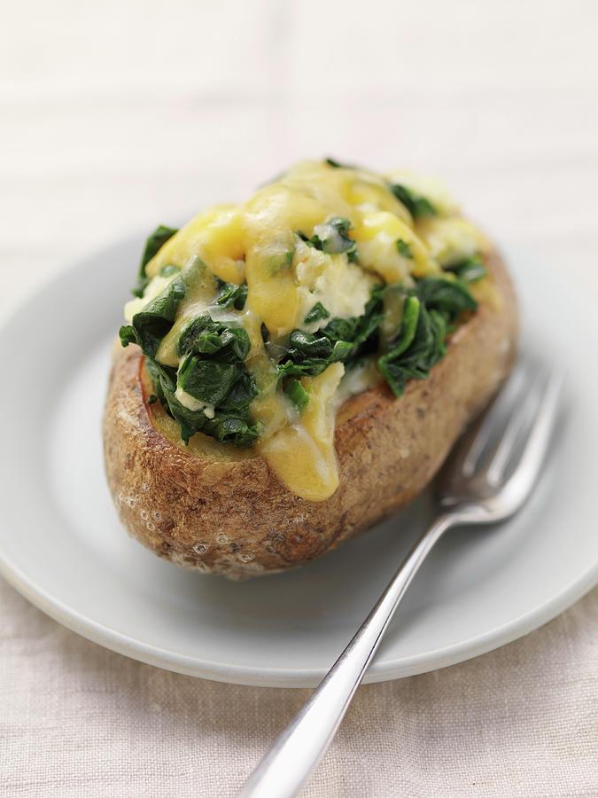 Twice-baked Potato With Cheese And Spinach Photograph by Eising Studio - Food Photo & Video