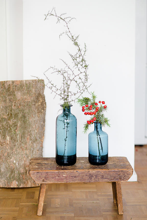 Twigs In Two Blue Vases And On Old Stool Photograph by Iris Wolf