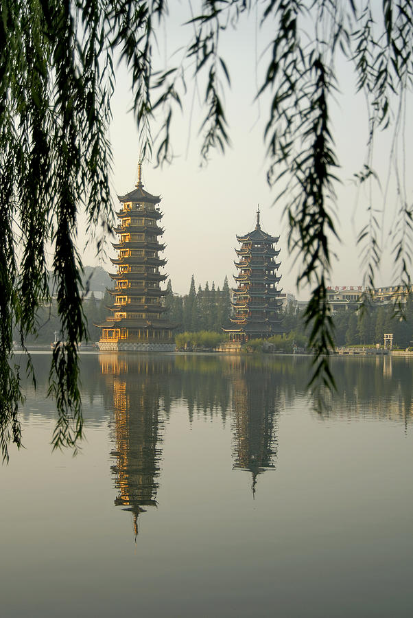 Twin Pagodas Of Guilin Photograph by Izzet Keribar