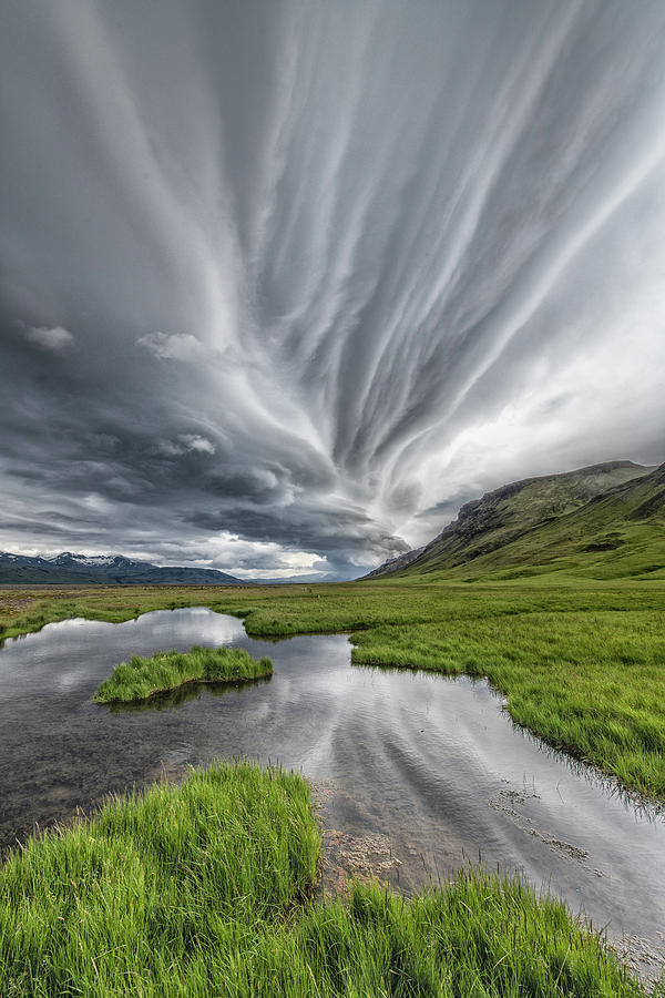 Landscape Photograph - Twisted Clouds by Marc Pelissier