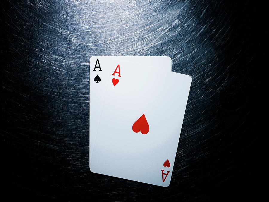 Two Aces Playing Cards On Stainless Photograph by Ballyscanlon