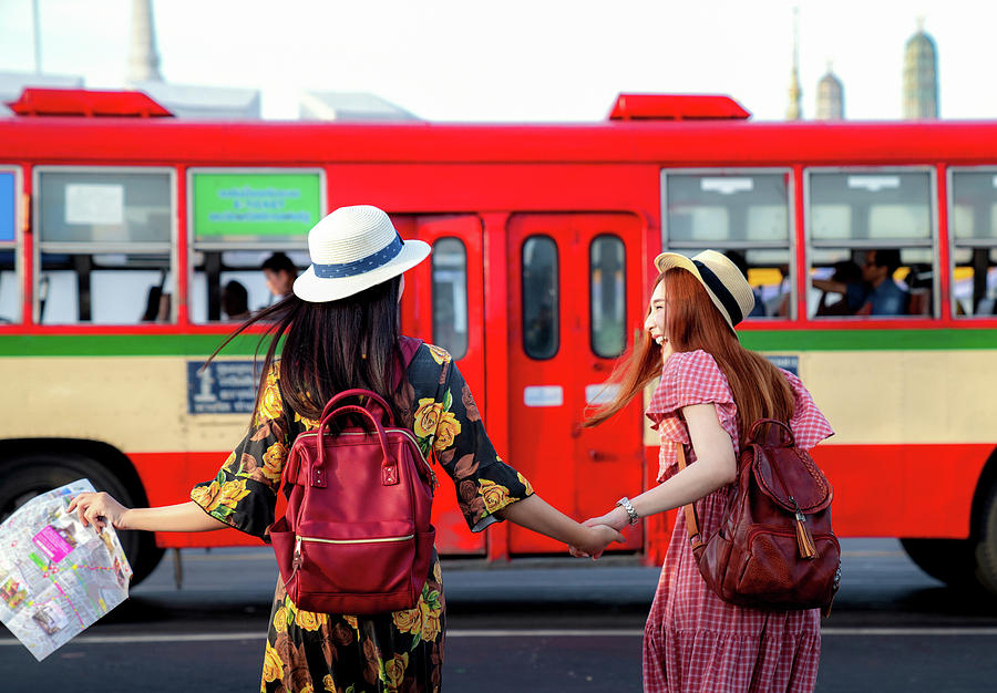 Two Asian Girlfriends Traveling And Transportation By Bus Photograph By