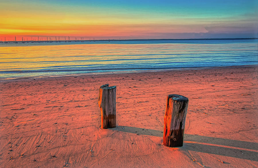 Two Beach Pilings At Sunset Photograph by Gary Slawsky