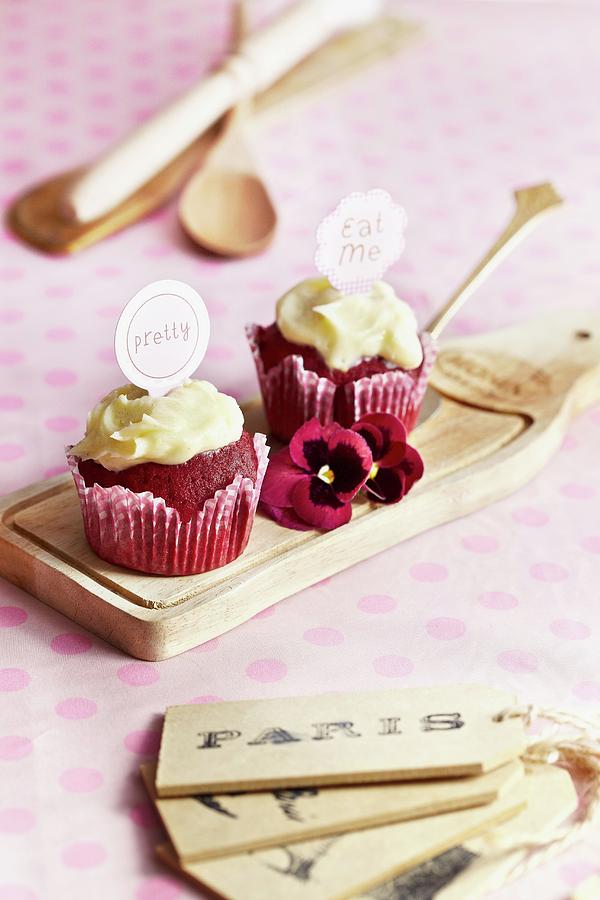 Two Berry Cupcakes With Frosting And Labels Photograph by Tim Atkins Photography