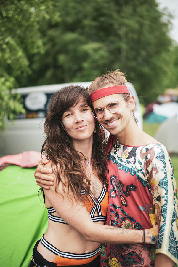 Two Bohemian Friends Hugging Smiling Wearing Funky Clothes At Festival  Photograph by Cavan Images - Pixels