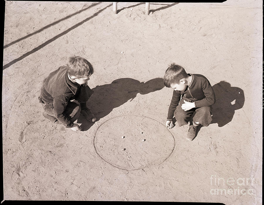 Two Boys Playing Marbles Photograph by Bettmann