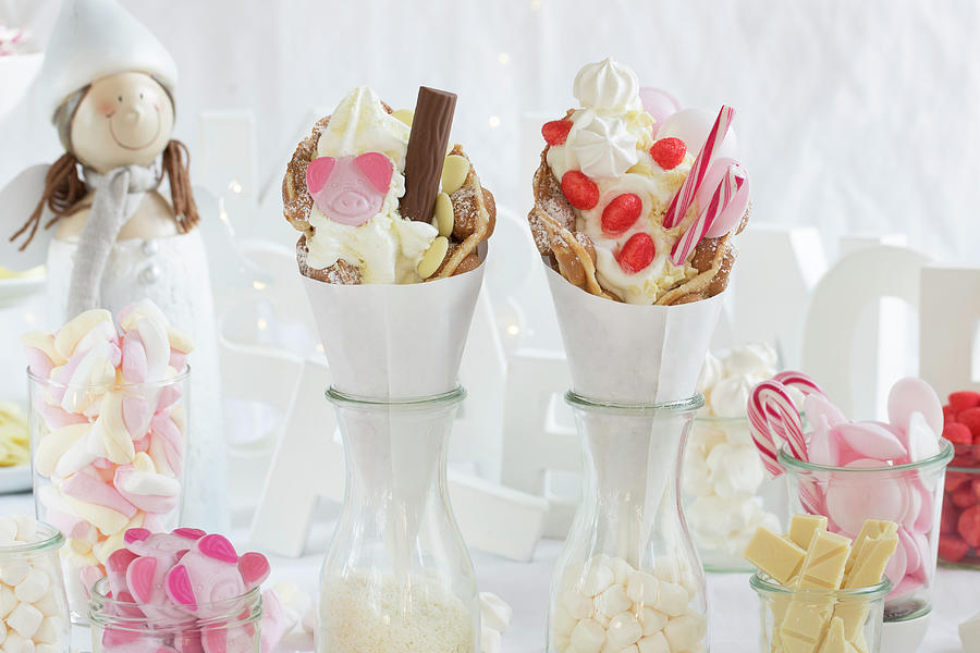 Two Bubble Waffles On A Candy Bar Table With Candy Canes And Chocolate Photograph by Esther Hildebrandt