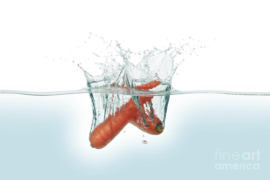 Two Carrots Splashing In Water Photograph by Leonello Calvetti/science Photo Library