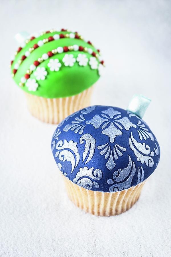 Two Christmas Bauble Cupcakes Photograph by Philip Mowbray And Hercules Cakehouse