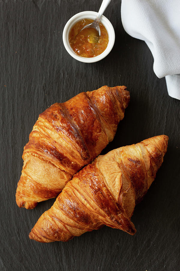 Two Classic French Flaky Croissants With Orange Confiture Photograph by Albert P Macdonald