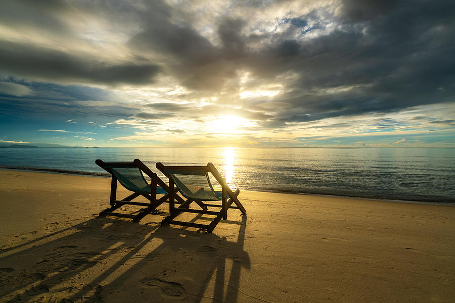 Two Deckchairs On The Beach At Sunset Photograph By Prasit Rodphan 