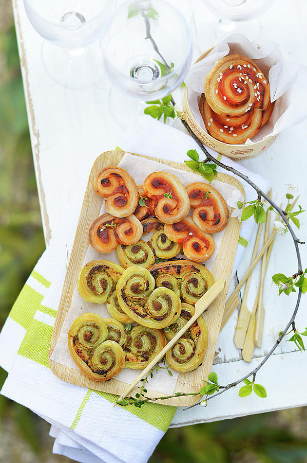 Two Different Pesto Palmiers For An Aperitif Outdoors Photograph by Keroudan