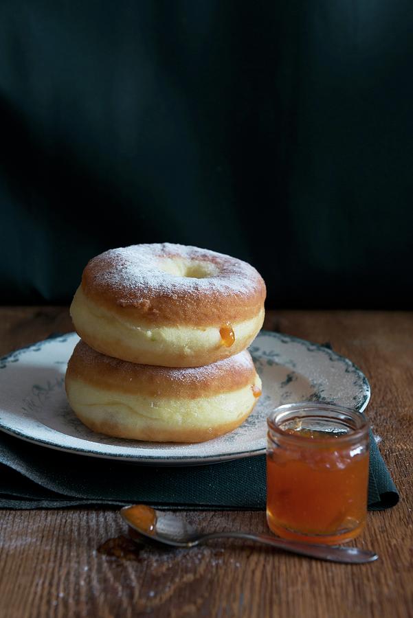 Two Doughnuts With Apricot Jam And Icing Sugar Photograph by Veronika Studer