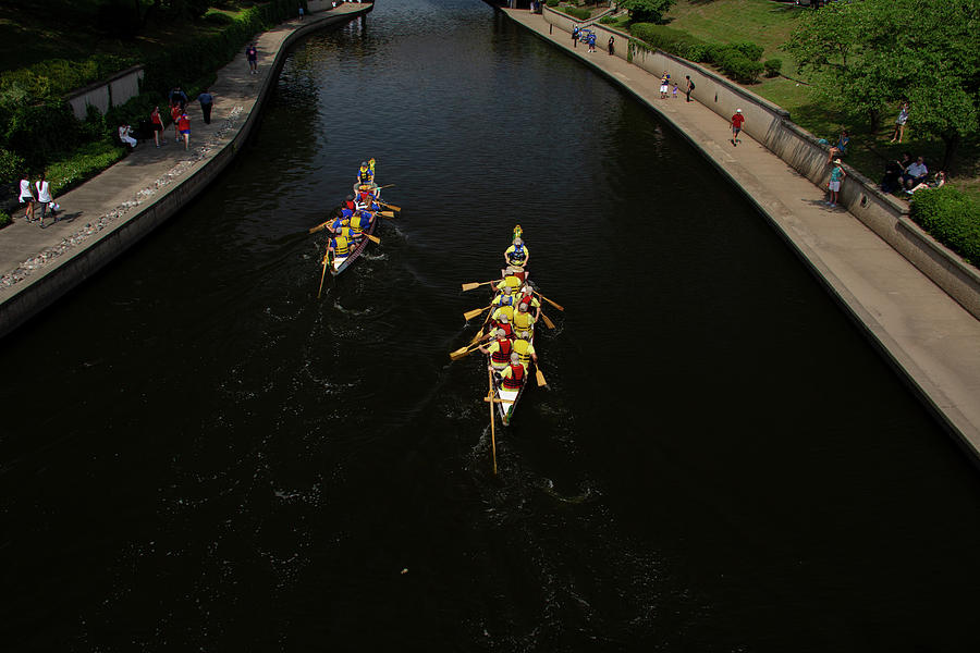 Boat Photograph - Two Dragon Boats Race down Brush Creek by Beth Partin