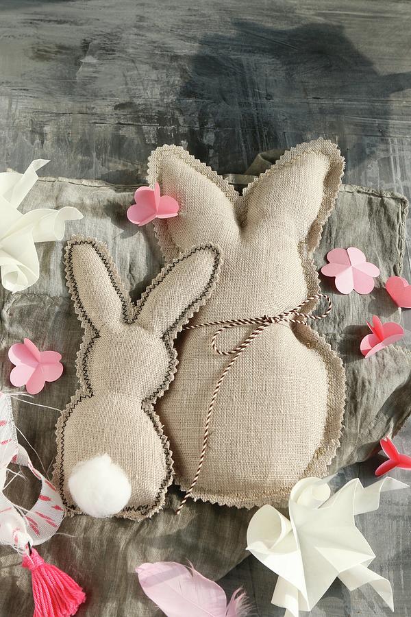 Two Fabric Rabbits With Zig-zag Edge And Paper Flowers Photograph by Regina Hippel