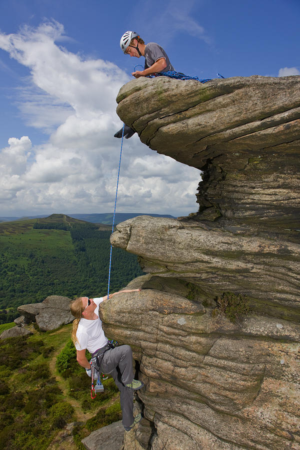 Two Friends Are Climbing At Stanage Edge In The Peak District ...