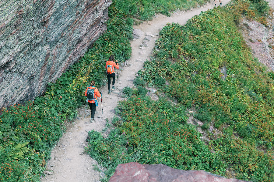 A Girl Is Hiking Beautiful Mountain by Evgeny Vasenev