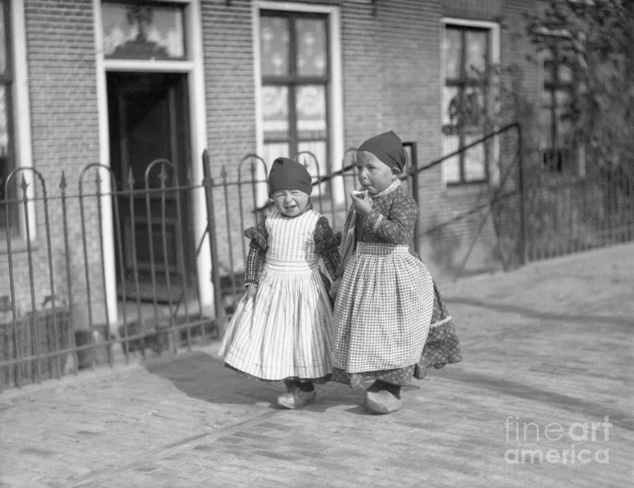 Two Girls Walking In Holland Photograph by Bettmann