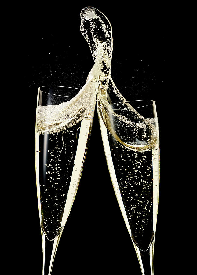 Two Glasses Of Champagne Photograph by Jack Andersen