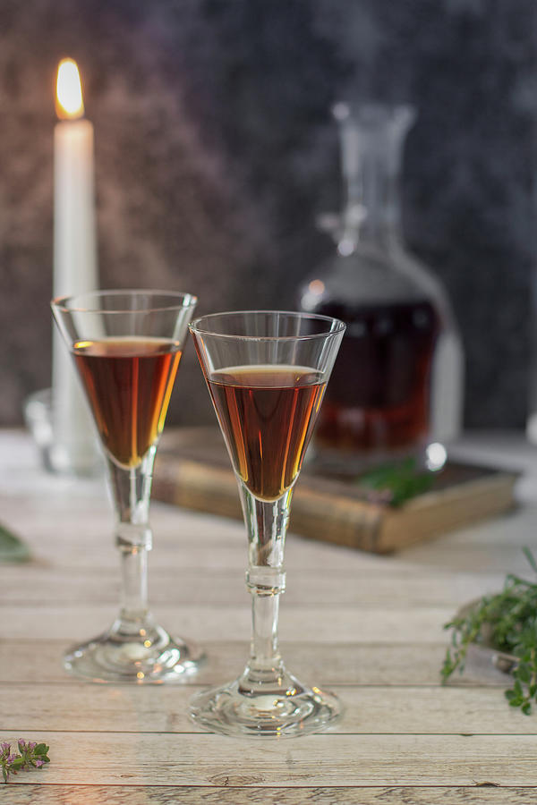 Two Glasses Of Herbal Liqueur Photograph by Barbara Djassemi