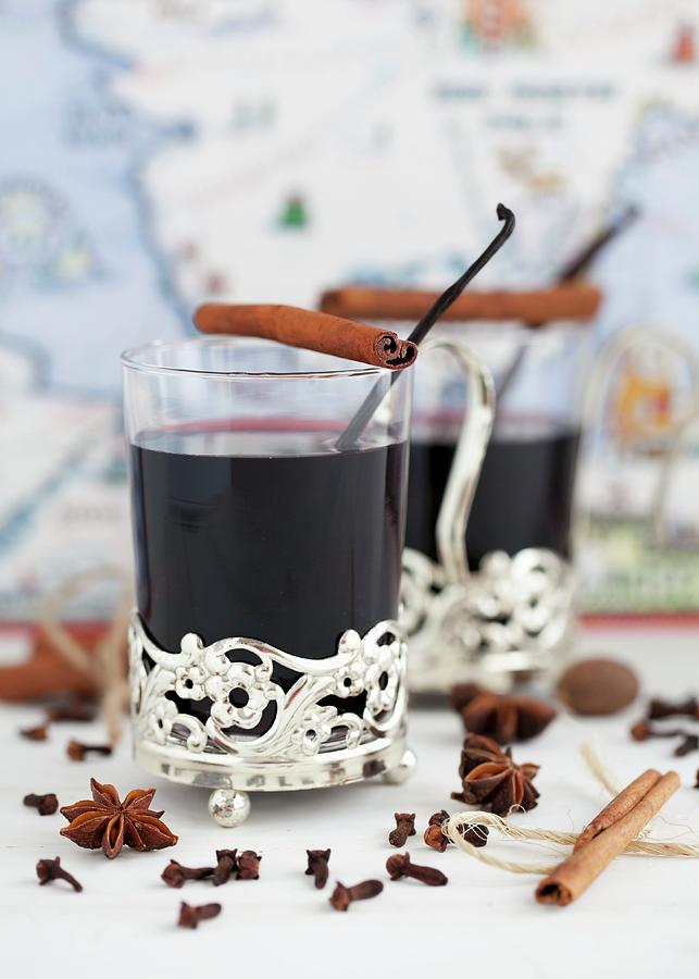 Two Glasses Of Mulled Wine With Spices Photograph by Jane Saunders