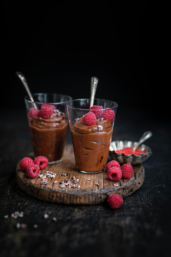 Two Glasses Of Vegan Chocolate Mousse Decorated With Fresh Raspberries Photograph by Lucy Parissi