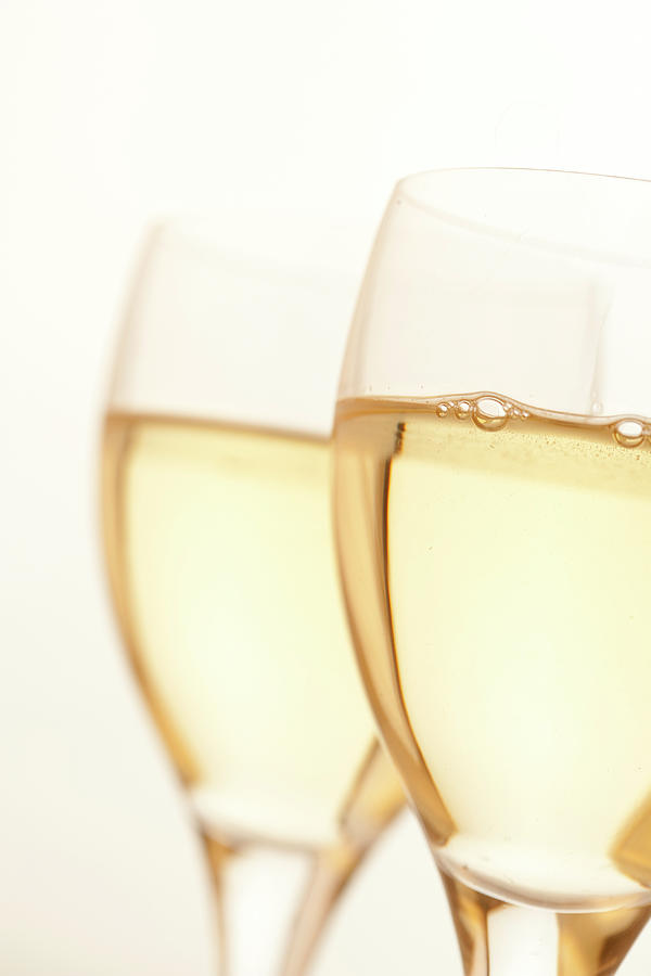 Two Glasses Of White Wine Photograph by Ross Durant Photography