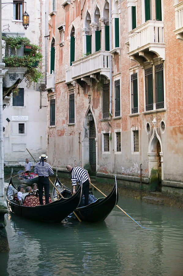 Two Gondolas Side By Side In Canal In Photograph by Photodisc