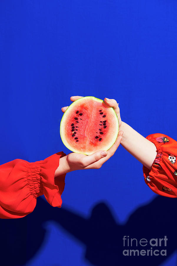 Two Hands Holding Watermelon Photograph by Tara Moore