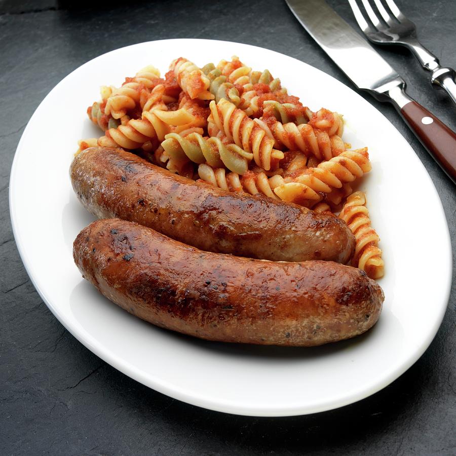 Two Italian Sausages salsiccia With Pasta Tricolore Photograph by Paul Poplis