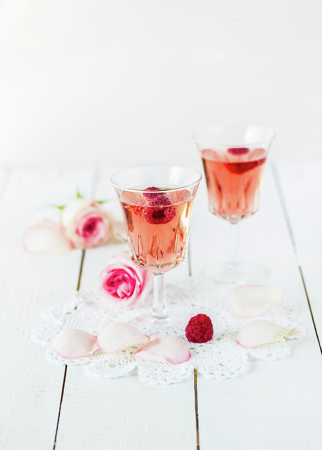 Two Jars Of Raspberry And Rose Champagne Photograph by Emma Friedrichs
