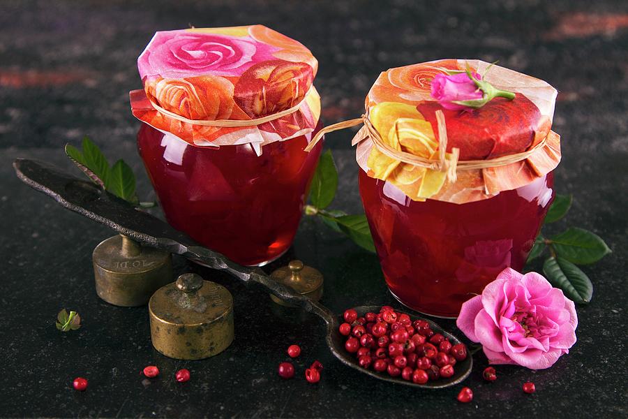 Two Jars Of Rose Petal Jelly With Cranberries Photograph by Monika Halmos