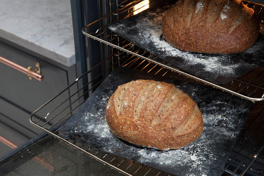 Two Loaves Of Sourdough In The Oven, Ready To Come Out Photograph by Andr Ainsworth