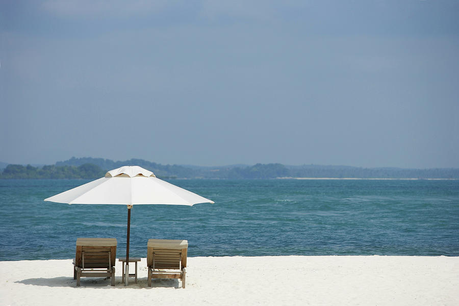 Two Lounge Chairs On White Sand Beach Photograph by Asia Images