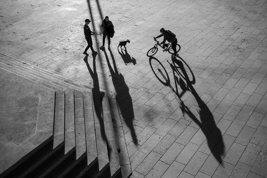Two Mans Dog And Cyclist Photograph by Dragan Lapcevic