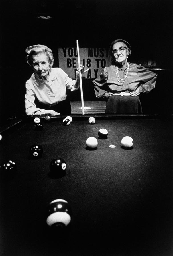 Two Mature Women Playing Pool In Black Photograph by Tim Bieber Two Mature Women Playing Pool In Black Photograph by Tim Bieber